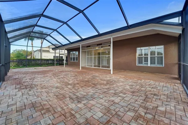 a house view with a backyard
