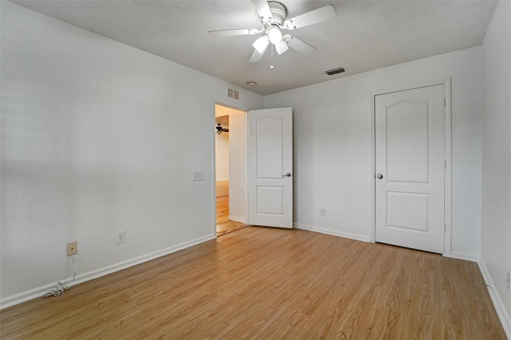 19111 Fern Meadow Loop Lutz, FL 33558 - Photo 17 of 41 wooden floor in an empty room