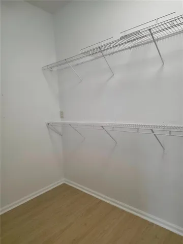 a view of a room with racks on the wall