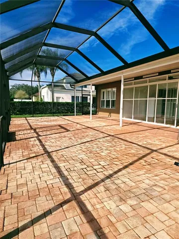 a view of a backyard of the house