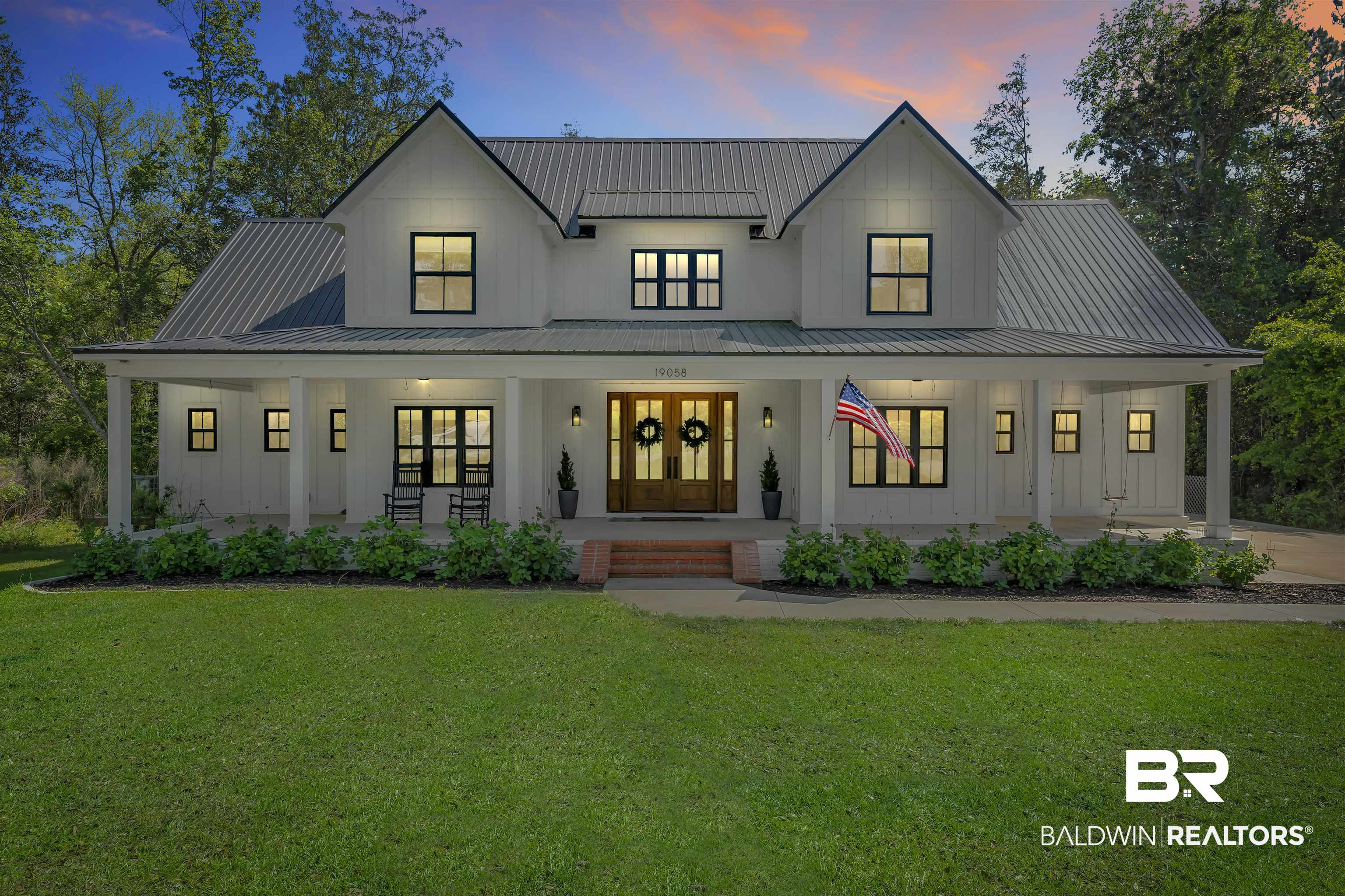19058 James Road Gulf Shores, AL 36542 - Photo 45 of 49 Modern inspired farmhouse featuring a porch, board and batten siding, and a front yard