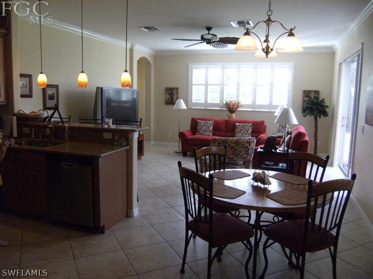 12405 Rock Ridge Lane Fort Myers, FL 33913 - Photo 11 of 23 a view of a dining room with furniture