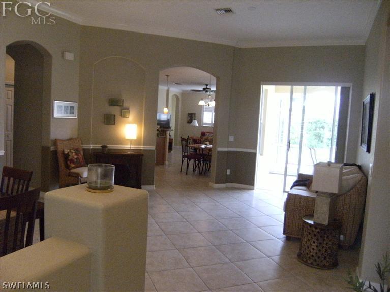 12405 Rock Ridge Lane Fort Myers, FL 33913 - Photo 8 of 23 a living room with furniture and a large window