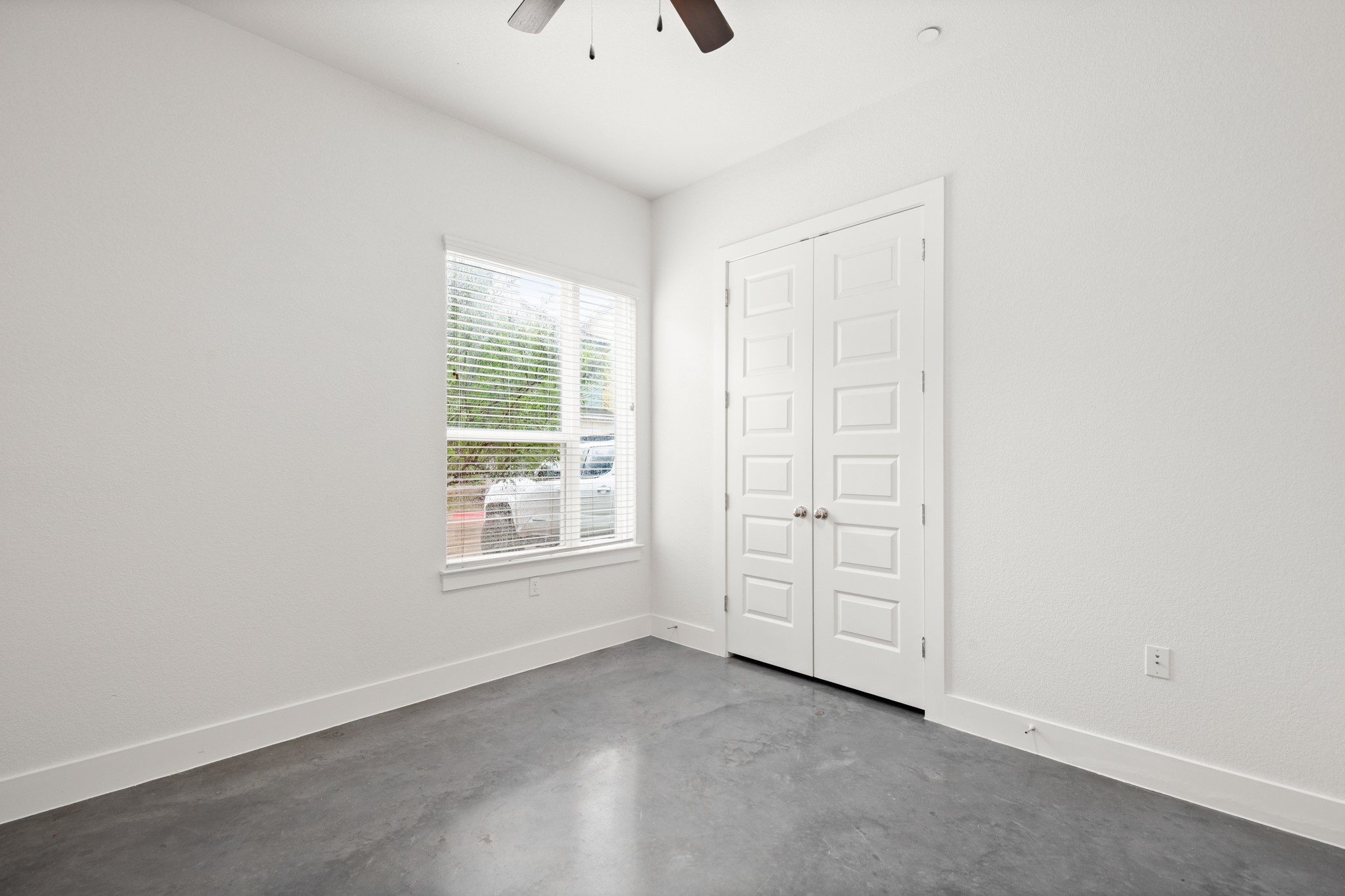 8922 Manchaca Road, Unit 701 Austin, TX 78748 - Photo 10 of 25 an empty room with windows and closet