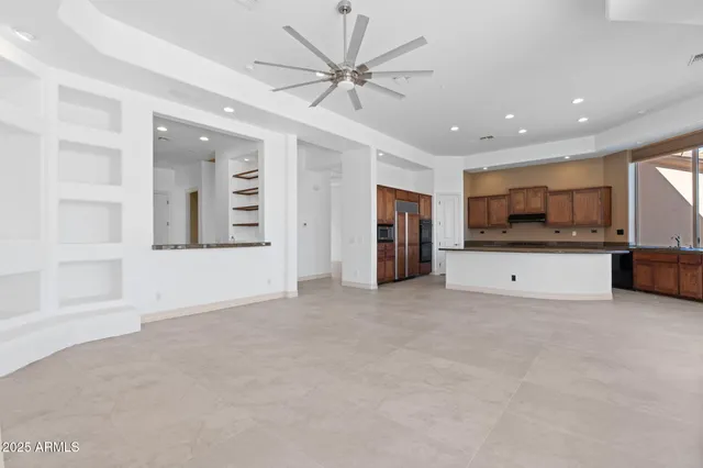 a room with a sink and a mirror