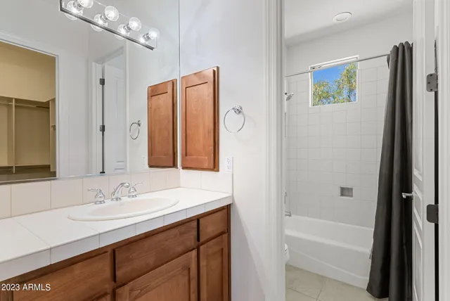 a swimming pool view with a outdoor seating