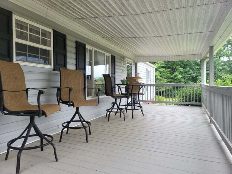 722 Hunt Valley Road Rocky Mount, VA 24151 - Photo 2 of 23 a view of a patio with table and chairs