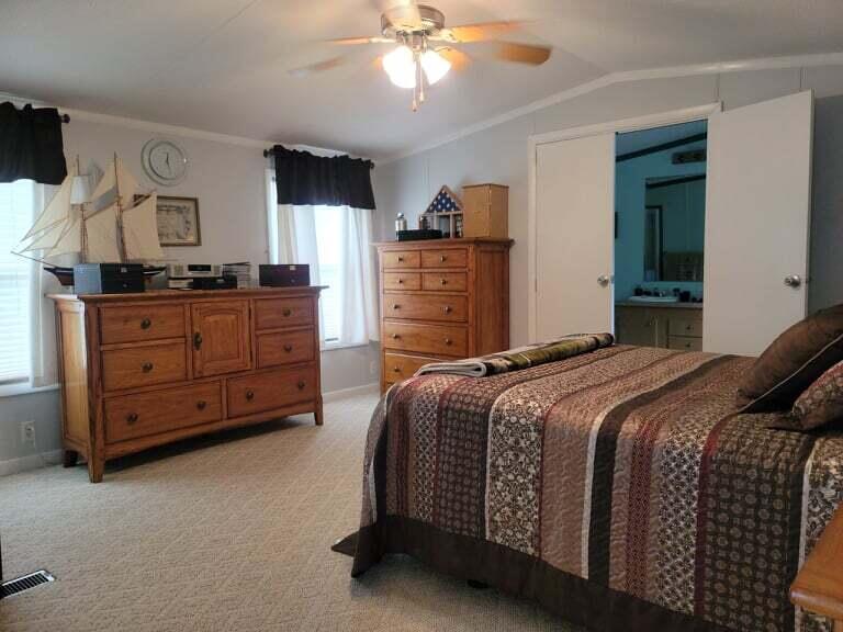722 Hunt Valley Road Rocky Mount, VA 24151 - Photo 12 of 23 a bedroom with a bed and a television