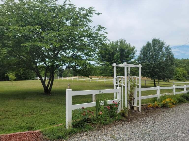722 Hunt Valley Road Rocky Mount, VA 24151 - Photo 10 of 23 a view of a chair and table on the green field