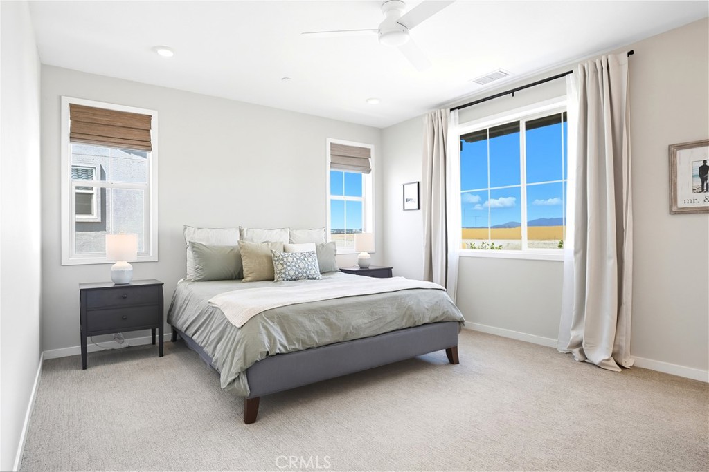 1341 Roots Way Rancho Mission Viejo, CA 92694 - Photo 24 of 75 a spacious bedroom with a bed and a window
