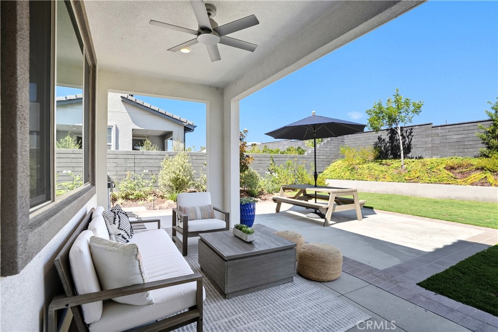 1341 Roots Way Rancho Mission Viejo, CA 92694 - Photo 3 of 75 a living room with furniture and a large window