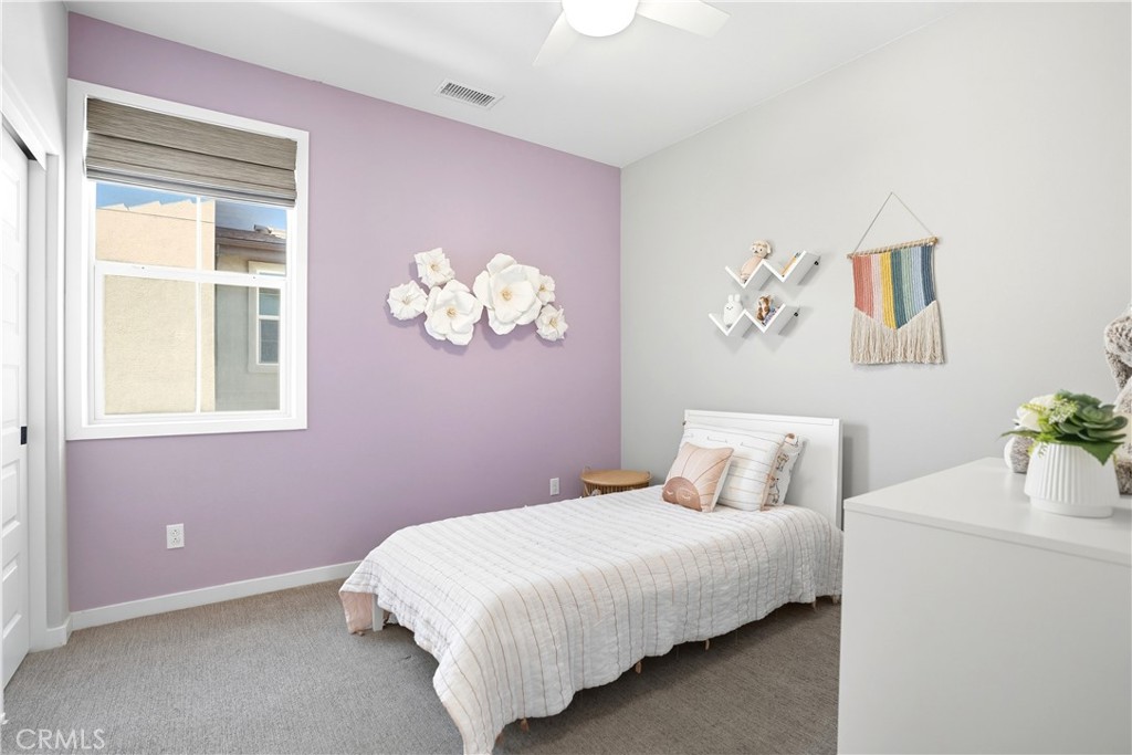 1341 Roots Way Rancho Mission Viejo, CA 92694 - Photo 35 of 75 a bedroom with a bed and a window