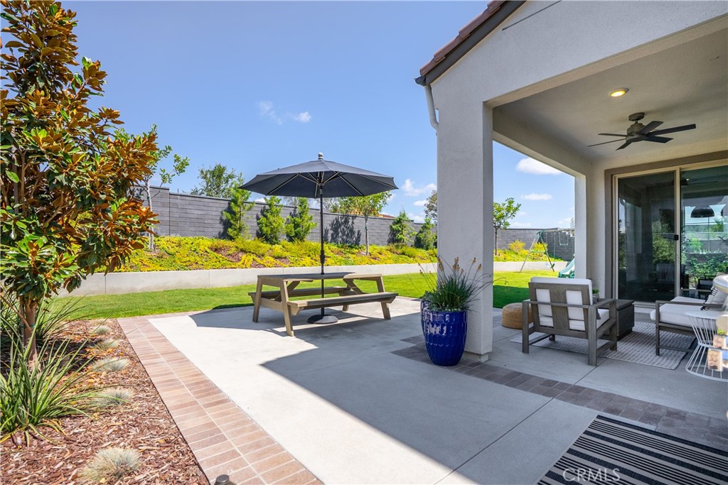 1341 Roots Way Rancho Mission Viejo, CA 92694 - Photo 5 of 75 a view of a swimming pool with a patio