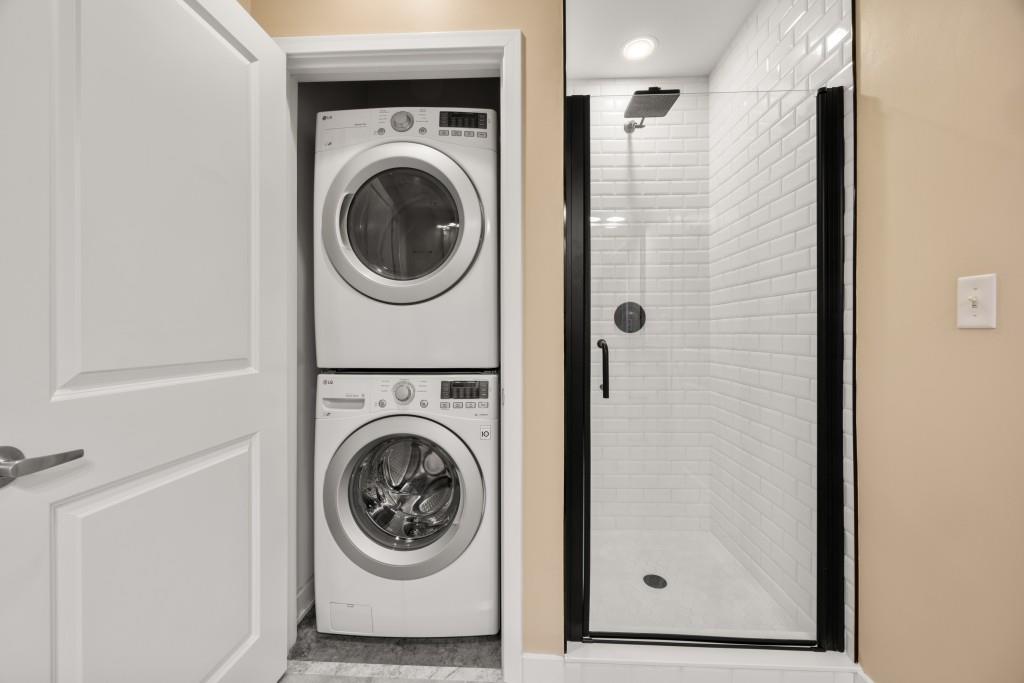 923 Peachtree Street Northeast, Unit 932 Atlanta, GA 30309 - Photo 20 of 69 a view of a hallway with washer and dryer