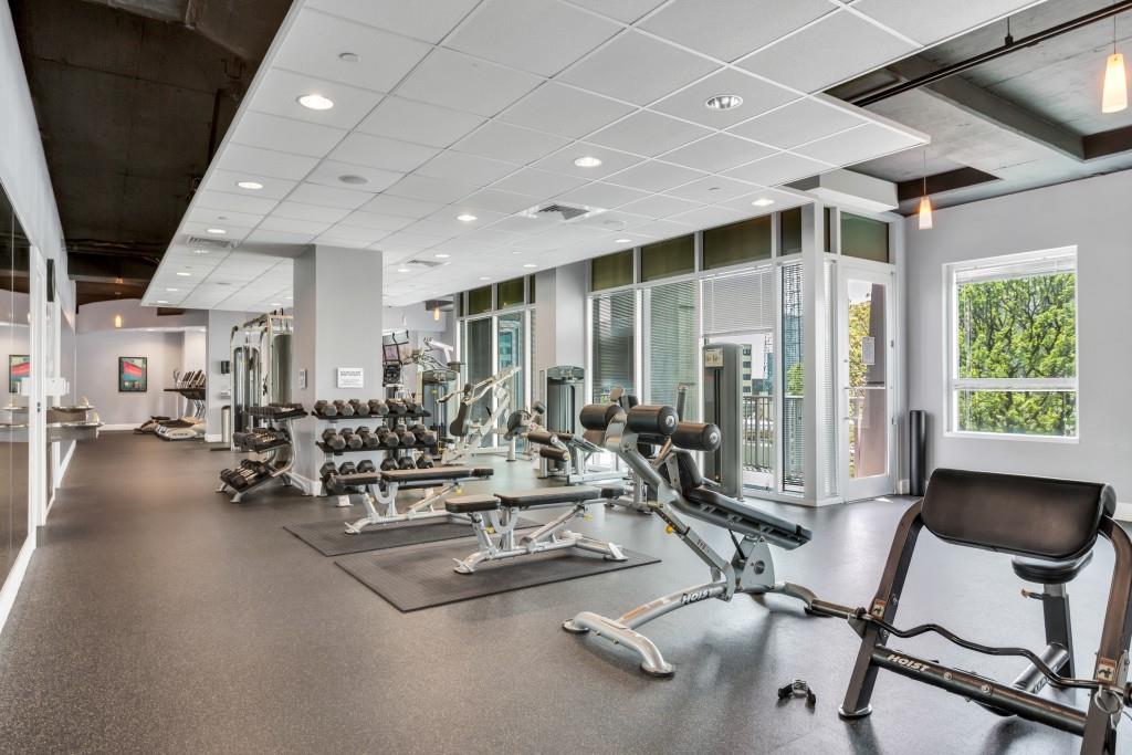 923 Peachtree Street Northeast, Unit 932 Atlanta, GA 30309 - Photo 47 of 69 a view of a room with gym equipment