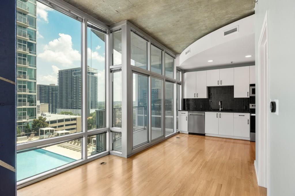923 Peachtree Street Northeast, Unit 932 Atlanta, GA 30309 - Photo 8 of 69 a view of a living room with a large window