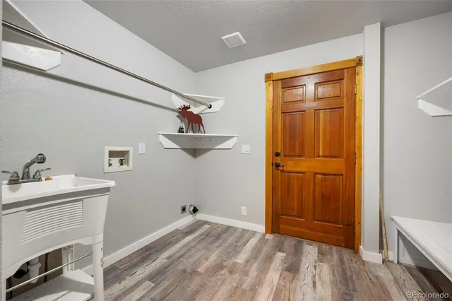 a view of storage and utility room