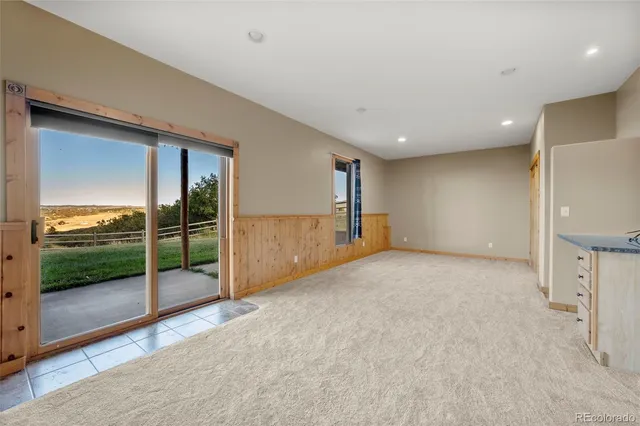 a view of a livingroom with a staircase