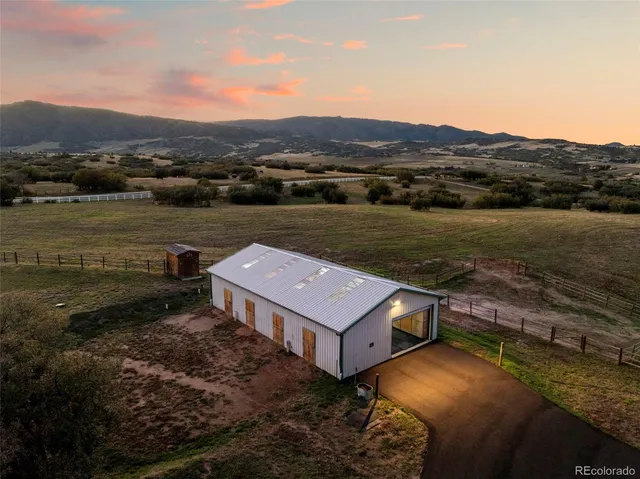 a view of an ocean and mountain