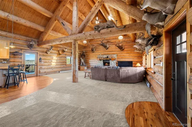 a view of a chairs and table in a room