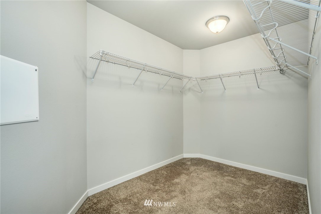 15809 Meridian Avenue South Bothell, WA 98012 - Photo 20 of 32 a view of a room with racks on the wall