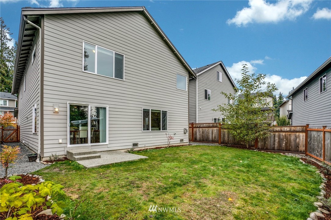 15809 Meridian Avenue South Bothell, WA 98012 - Photo 30 of 32 a front view of house with yard