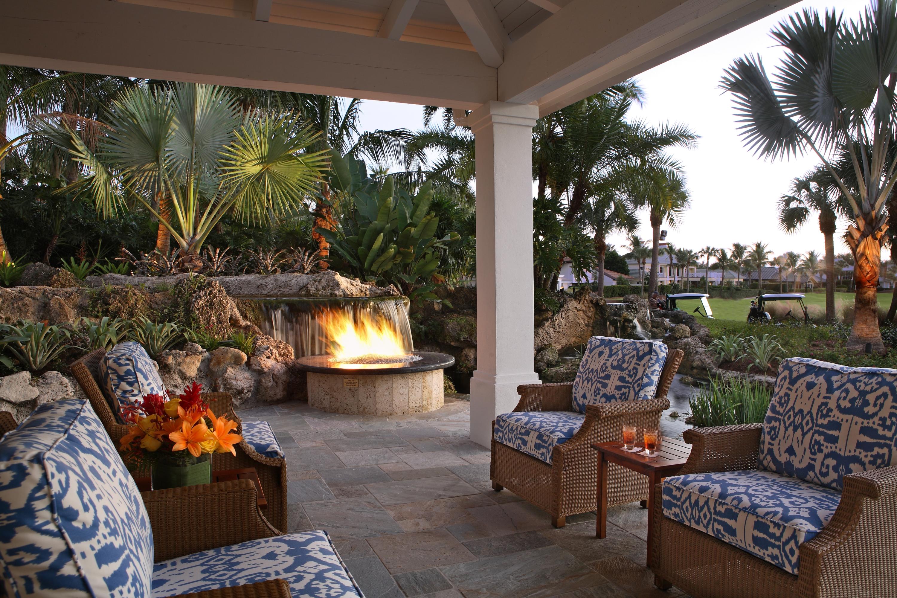 108 Micco Circle Jupiter, FL 33458 - Photo 11 of 20 a outdoor living room with furniture and a potted plant