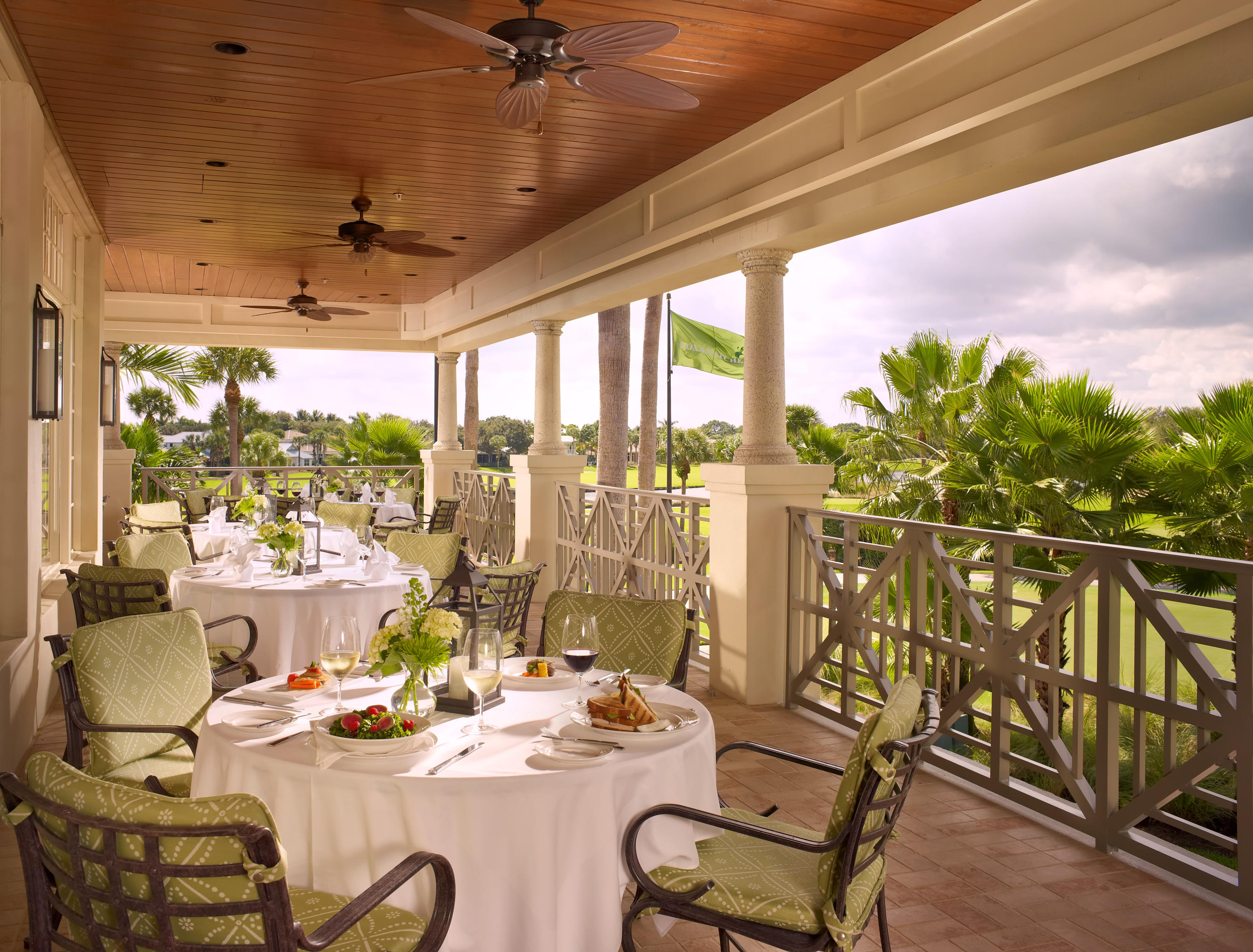 108 Micco Circle Jupiter, FL 33458 - Photo 16 of 20 a dining room with furniture water view and a floor to ceiling window