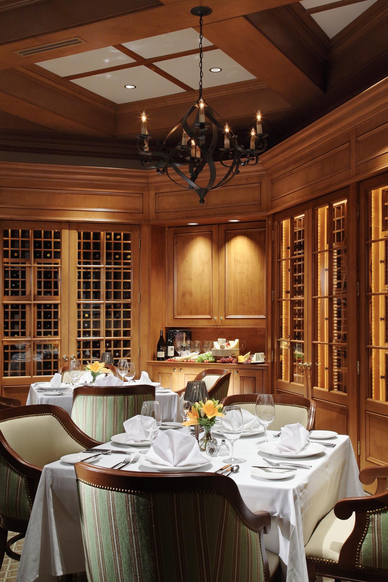 108 Micco Circle Jupiter, FL 33458 - Photo 19 of 20 a kitchen with a table chairs stove and cabinets