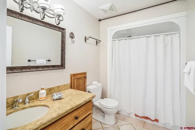 a view of a storage & utility room with a sink