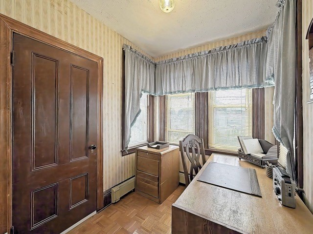 20 Locust Street Everett, MA 02149 - Photo 20 of 39 a room with gym equipment and large window