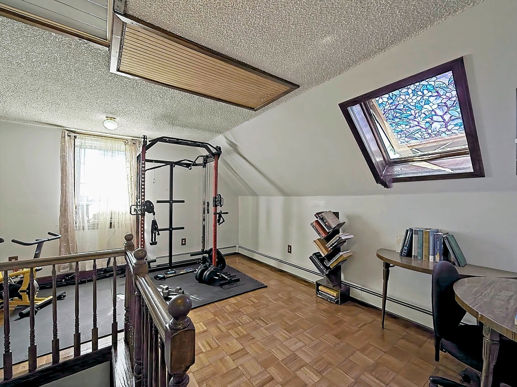 20 Locust Street Everett, MA 02149 - Photo 29 of 39 a view of a room with gym equipment
