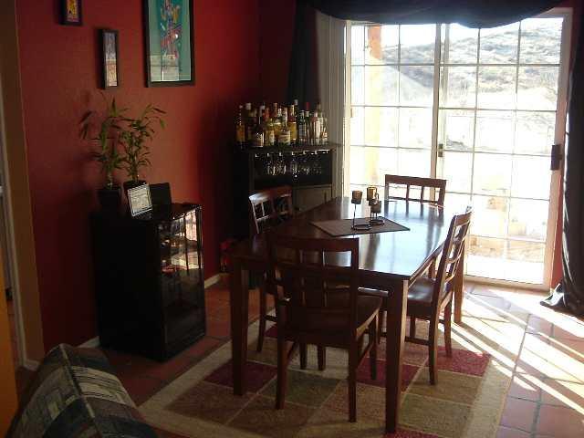 408 Ca Osito Rio Rico Az 85648 Rio Rico, AZ 85648 - Photo 3 of 9 a view of a dining room with furniture and window