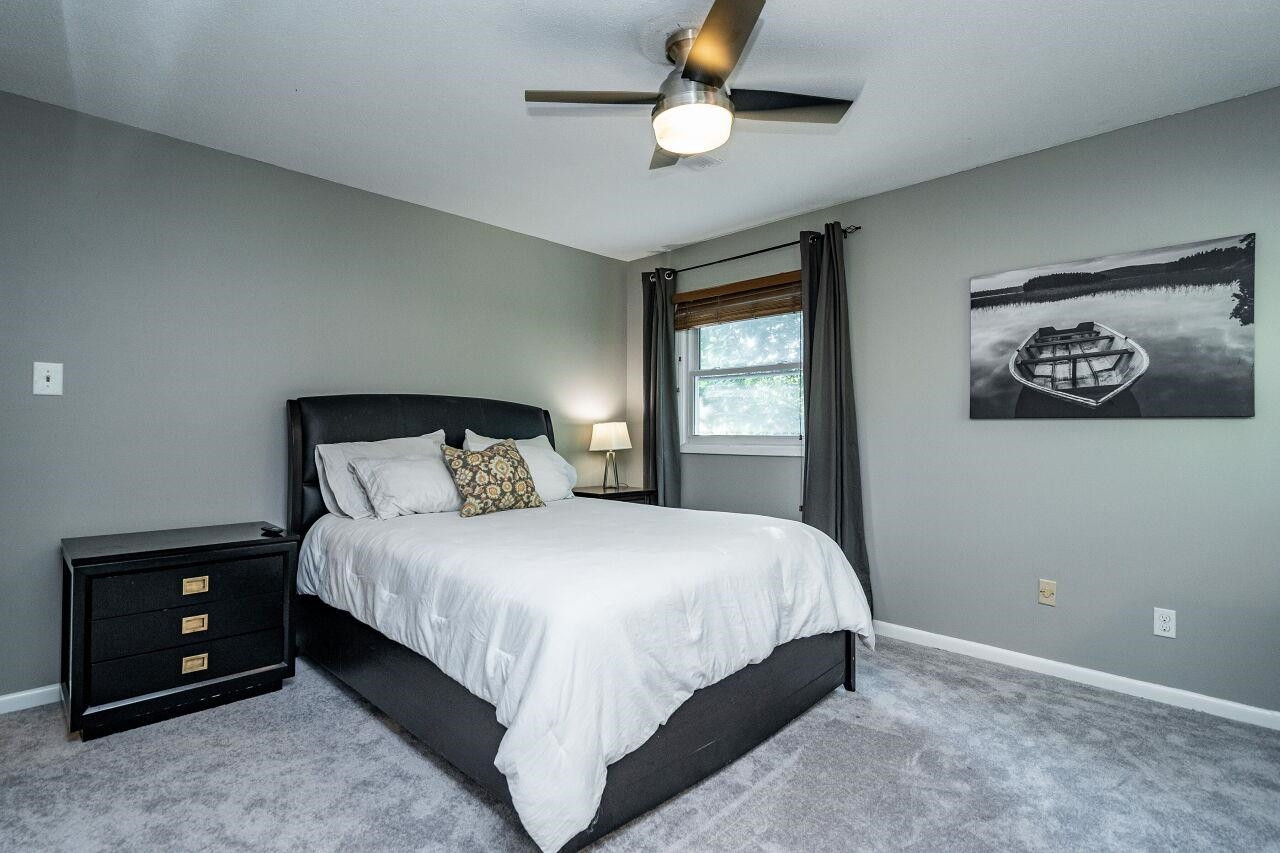 1500 Windbur Place Raleigh, NC 27609 - Photo 11 of 30 Large Bedroom can accommodate a king-sized bed and additional furniture pieces. Carpet is brand new. Owner's Suite