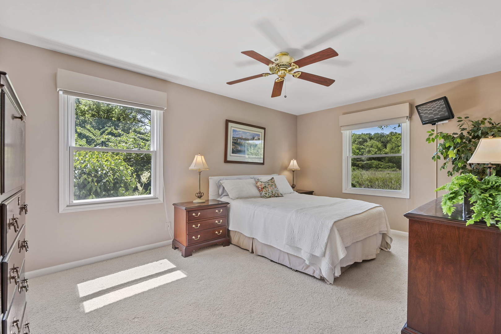 27-w710 Windermere Road, Unit 3201 Winfield, IL 60190 - Photo 11 of 20 a bedroom with a bed chandelier and a window