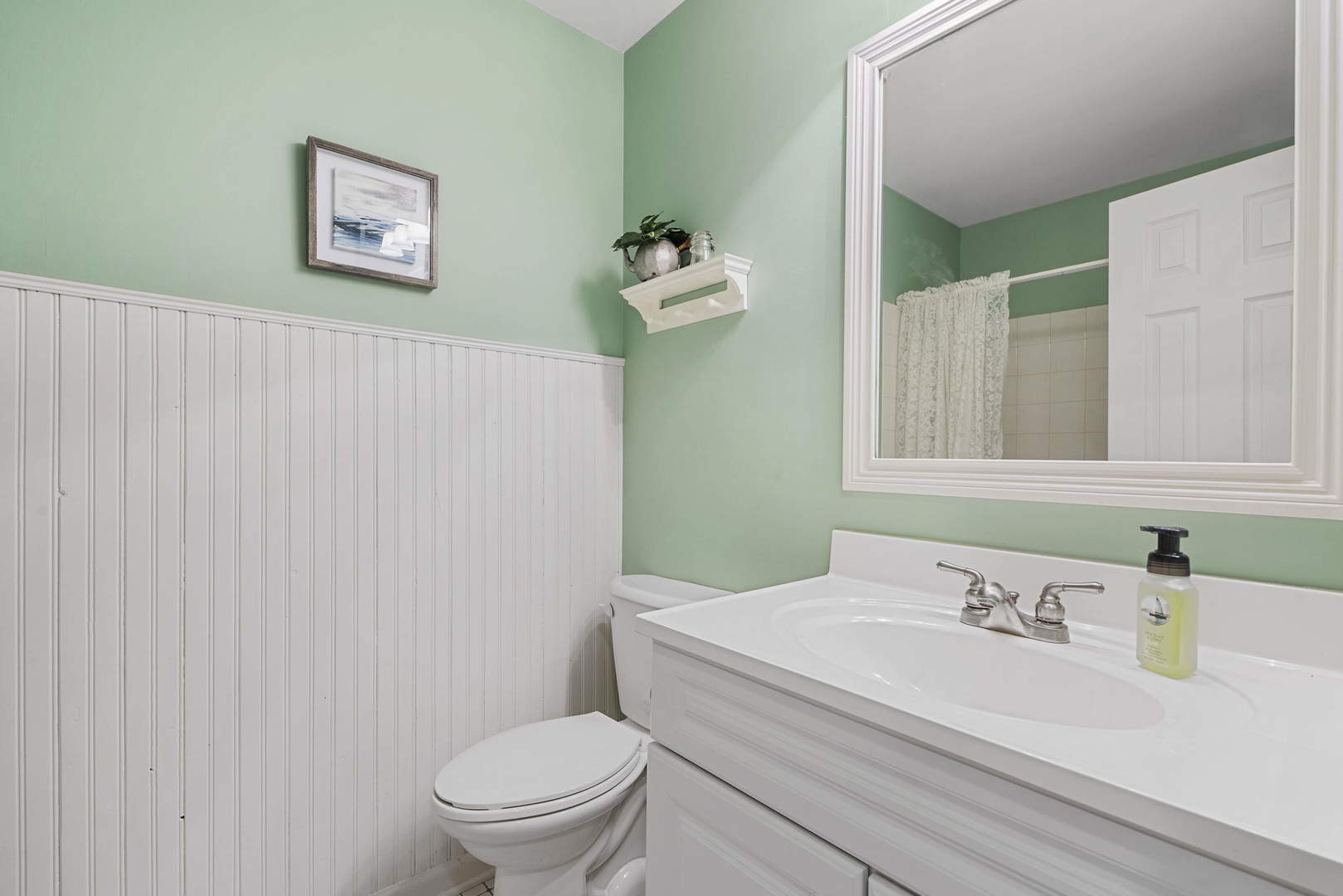 27-w710 Windermere Road, Unit 3201 Winfield, IL 60190 - Photo 13 of 20 a bathroom with a sink a toilet and a mirror
