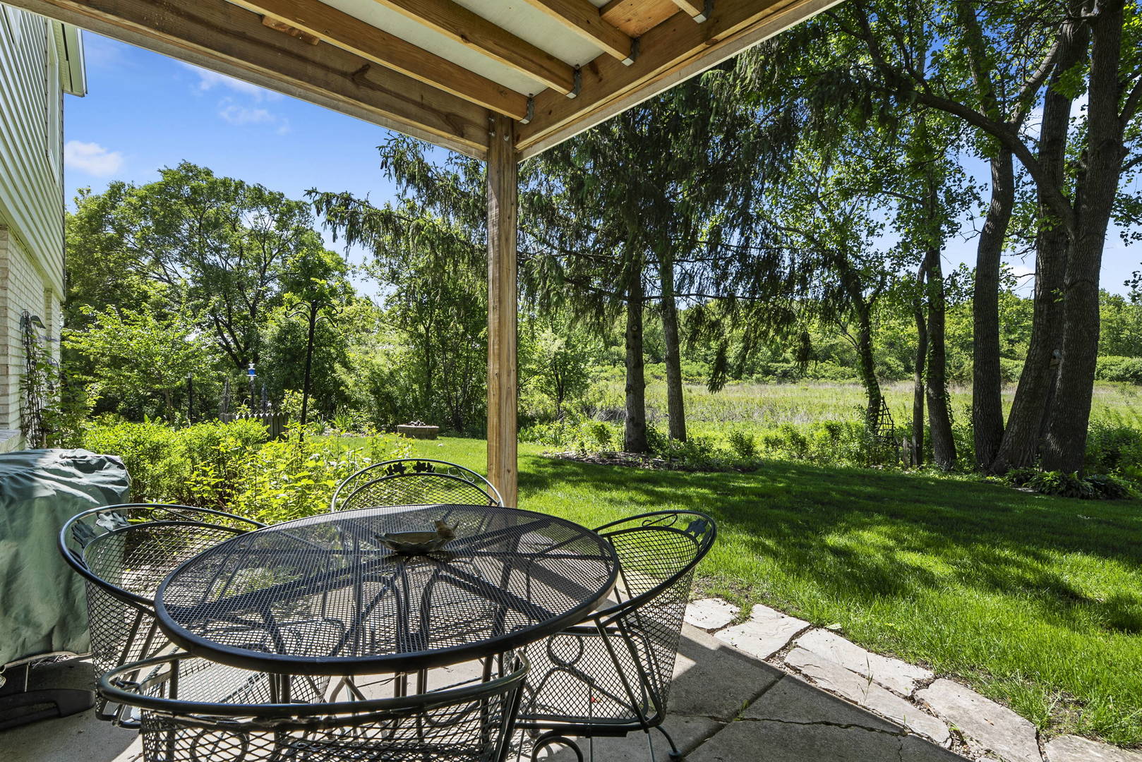 27-w710 Windermere Road, Unit 3201 Winfield, IL 60190 - Photo 15 of 20 a view of an outdoor sitting area with furniture and garden