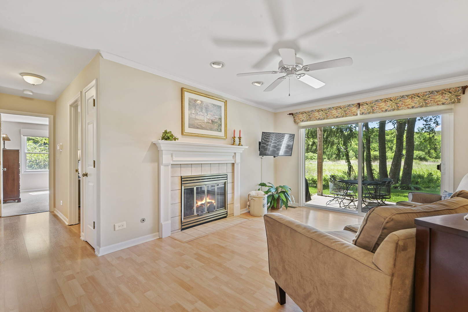 27-w710 Windermere Road, Unit 3201 Winfield, IL 60190 - Photo 5 of 20 a living room with furniture and a fireplace