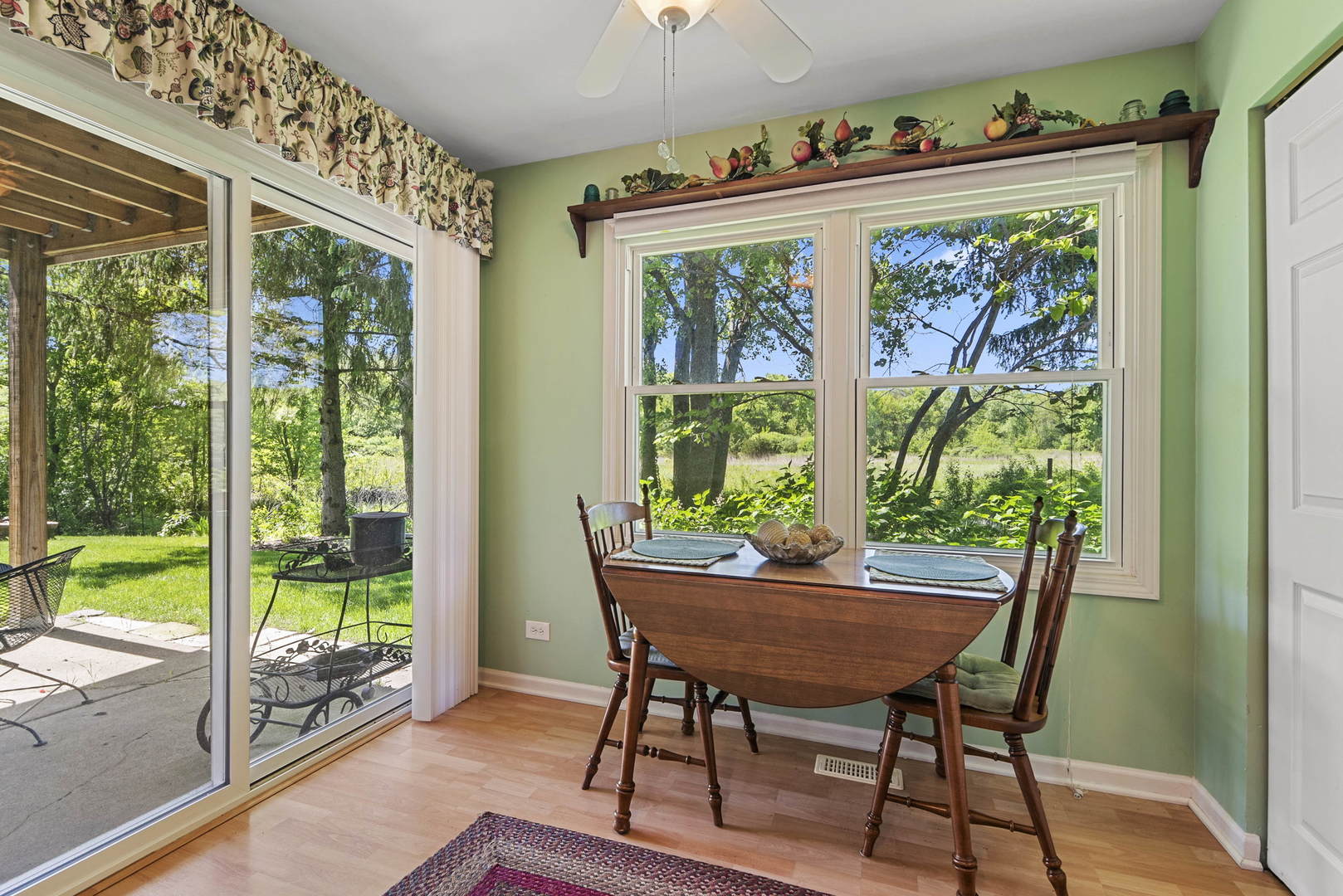 27-w710 Windermere Road, Unit 3201 Winfield, IL 60190 - Photo 9 of 20 a view of a dining room with furniture window and outside view