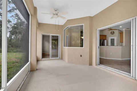 a view of a hallway with a porch