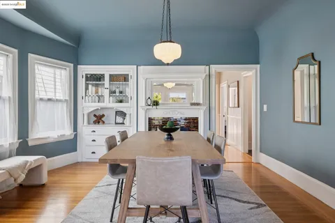 a view of a fireplace and cabinets