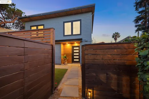 a view of brick building with a large windows