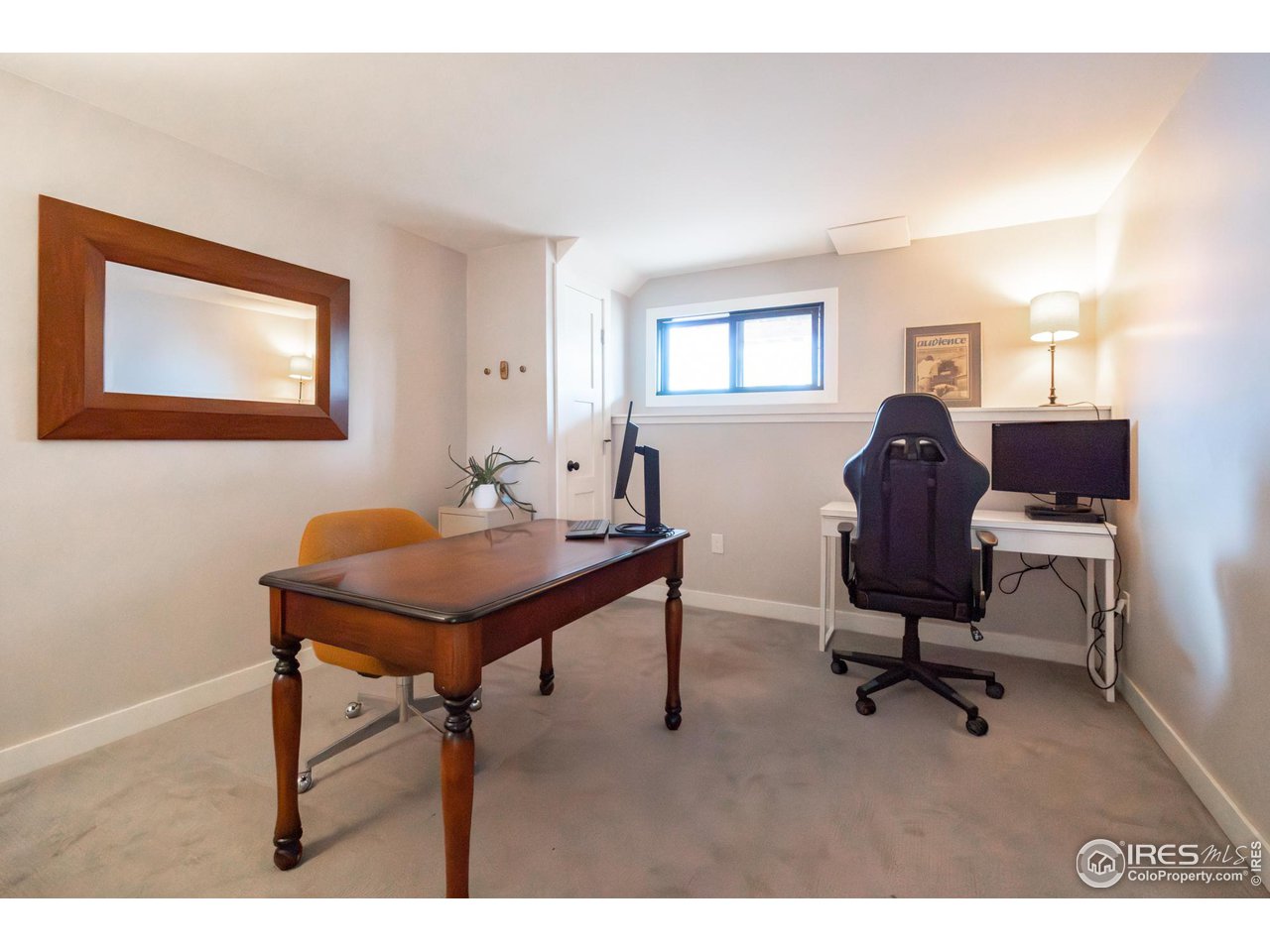 6474 Redwing Place Longmont, CO 80503 - Photo 10 of 11 a view of a workspace with furniture