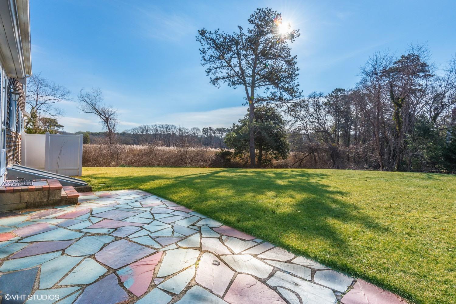 148 Katherine Road Centerville, MA 02632 - Photo 5 of 16 13_148KatharineRd_85_Patio_MLSuse_1500x1