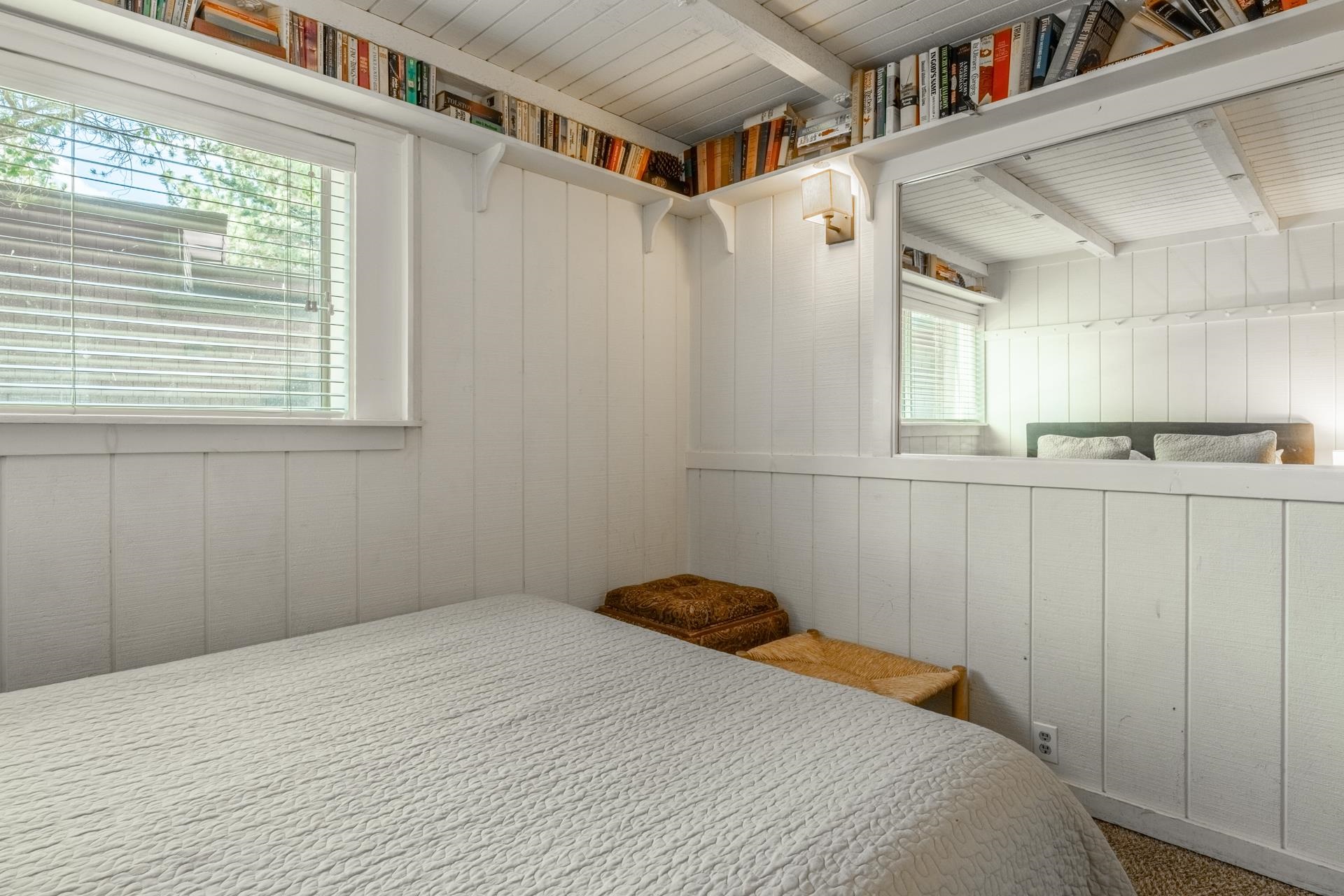 165 Old Mammoth Road, Unit 3 Mammoth Lakes, CA 93546 - Photo 28 of 48 Room featuring white paneled walls, a white slatted ceiling with exposed beams, and a window with blinds