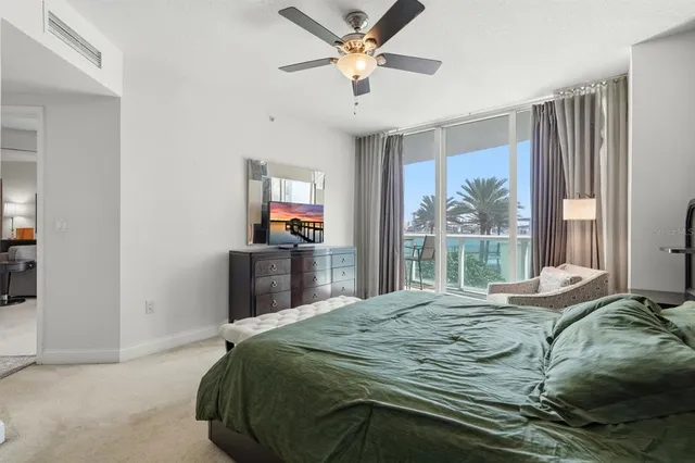 a spacious bathroom with a granite countertop sink a toilet and shower
