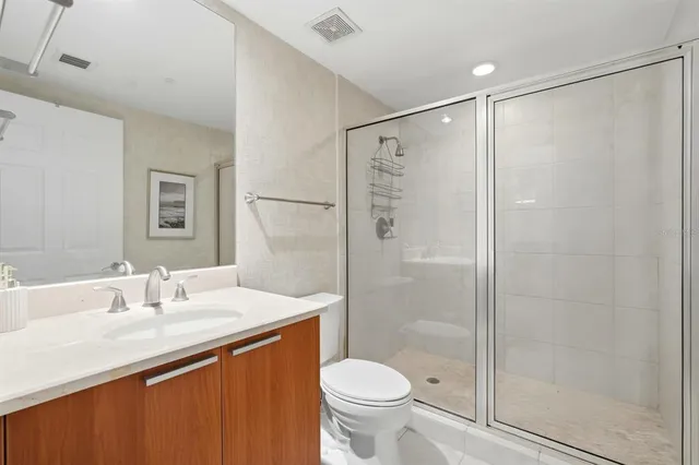 a bathroom with a tub and a shower