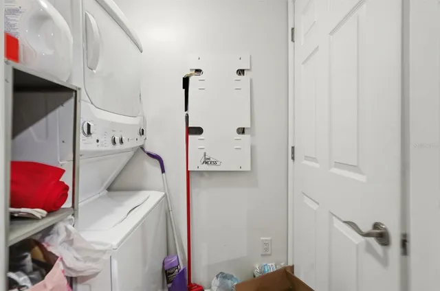 a view of swimming pool with outdoor seating and plants