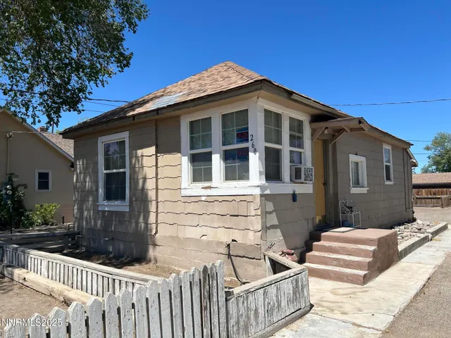 a front view of a house with a porch