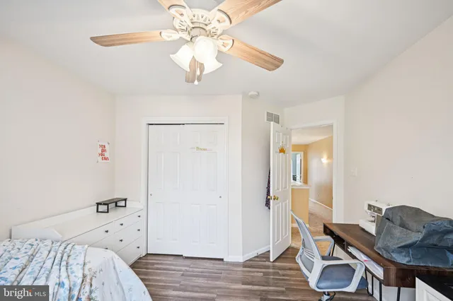 a view of a livingroom with furniture and wooden floor